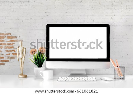 Comfortable workplace with modern desktop computer. Blank screen for graphic display montage.