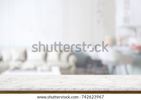 Empty white marble top table and blurred background. copy space for product display montage.