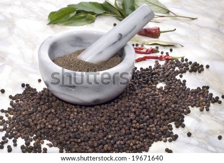 Still life of spice. Black pepper in mortar