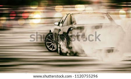 Car drifting, Blurred of image diffusion race drift car with lots of smoke from burning tires on speed track with bokeh
