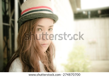 Soft focus,Close up trendy Hipster Girl Relaxing at the day time. Concept of Hipster girl Lifestyle.