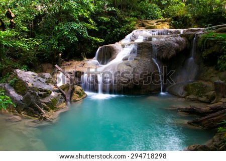 Arawan waterfall in tropical forest Thailand,leaf moving low speed shutter blur