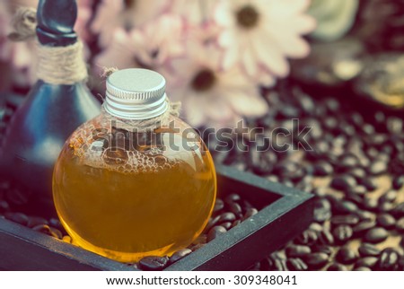 Body care product for spa on coffee bean background