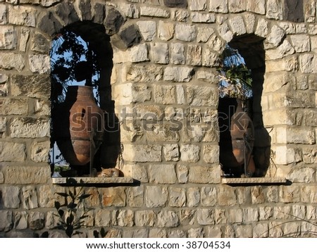 Old stony wall.Element decoration of the house