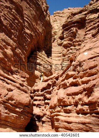 The lost valley (Ge Avud) is narrow canyon from red sandstone in Arava desert. Eilat mountains.Israel.
