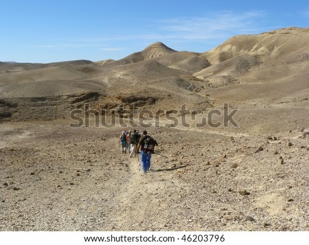 Hiking in Judean Desert. Judean Desert - a desert in the Middle East, located on the territory of Israel, on the west coast of the Dead Sea.