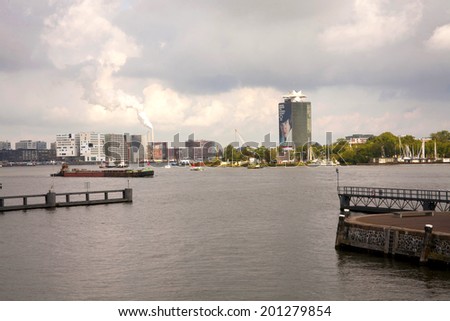 Amsterdam, Netherlands - August 9, 2012 : Amsterdam port and shipping channel highlighting The Eye Museum of Film