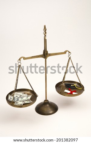 Scales balancing money vs a degree with mortar board.