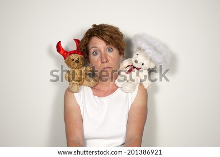 Woman with a Devil bear and an Angel bear on each shoulder