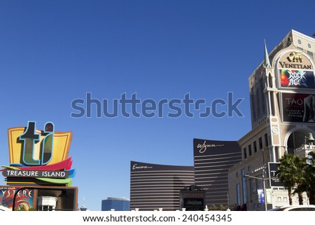 Las Vegas, NV, USA - December 22, 2014 : Signs for the Treasure Island, Venetian, Wynn, Enxore and Palazzo resorts