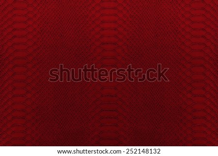 Texture background of red reptile leather