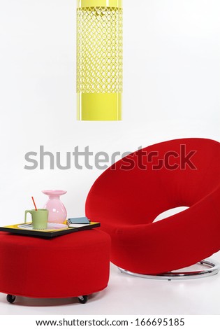 Modern Red Chair And A Coffee Table