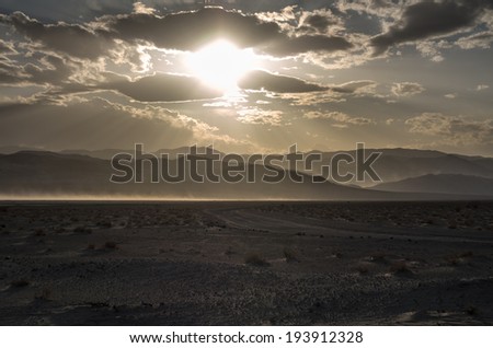 Wind, clouds and sun in the Death Valley