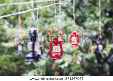 vintage kerosene oil lantern lamp hanging on the wire