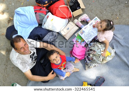 SERBIA, BELGRADE - September 01,2015: Park at the station migrants from Syria have turned into a small city. Some have even set up tents and in which they reside, while most sleep under the open sky