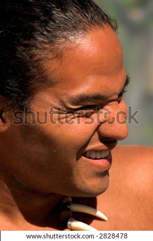 Young Polynesian man wearing a claw necklace