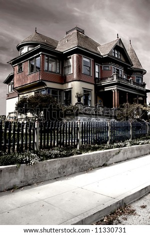 A dramatic image of a Victorian house, processed to give it a foreboding appearance