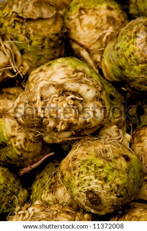 A bunch of celery root for sale at a farmers\' market