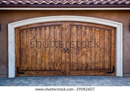 Wooden garage doors on an upscale California home