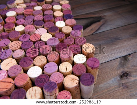 Background pattern of wine bottles corks on the wood