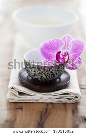 the image of flowers and tea cup