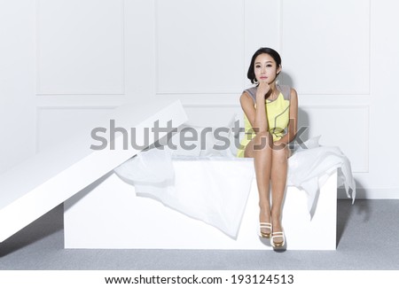 Korean woman with large shoe box