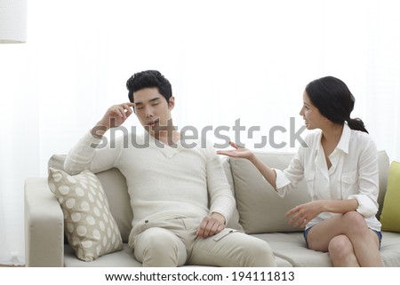 Asian couple disputing