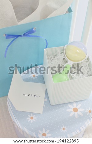 the image of giving birth and baby boy gifts