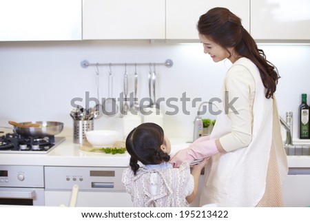 the image of a happy Asian family
