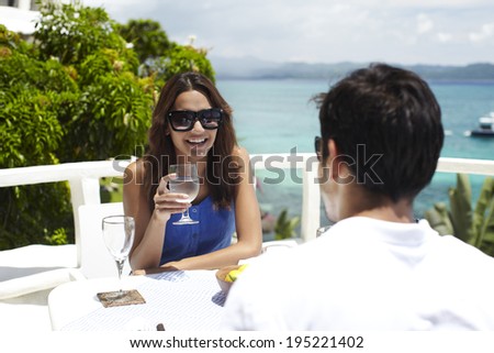 the image of couple having breakfast by the sea in Boracay in the Philippines