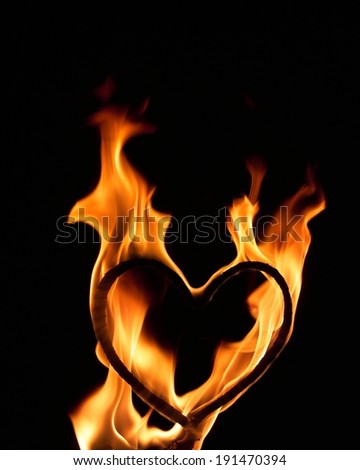 The depiction of fire flames around a heart shape