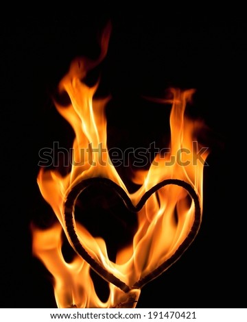 The depiction of fire flames around a heart shape