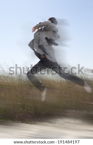 Korean man jumping and running