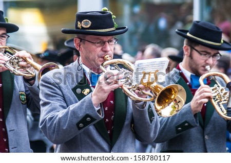 MUNICH, GERMANY - SEPTEMBER 21: Parade of the hosts of the tents of the Oktoberfest on September 21, 2013 in Munich, Germany