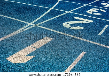 background of the start line of blue running tracks