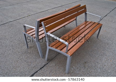 two benches standing with their backs together