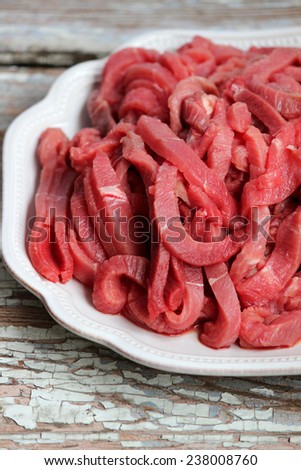 Fresh meat cut into thin strips