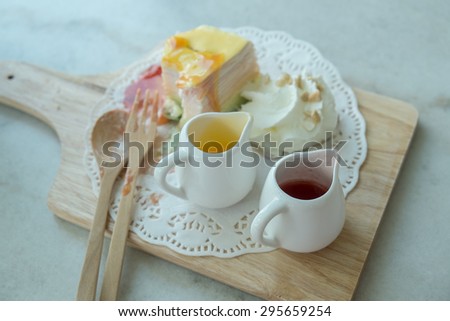 Rainbow Crepe Cake on the marble table