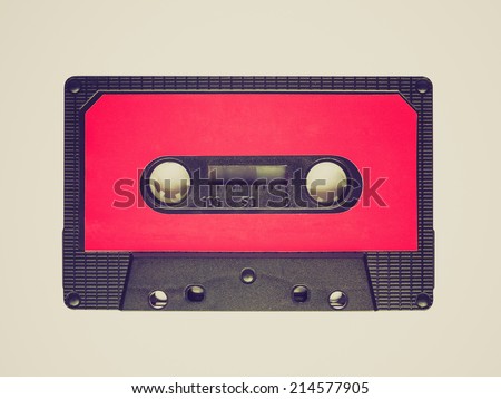 Vintage looking A vintage audio tape cassette isolated over white background