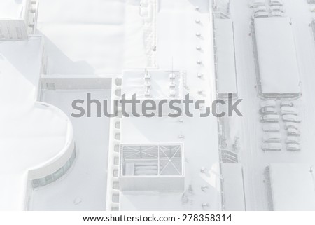 SAPPORO, JAPAN - JANUARY 13, 2014: Snow covered building rooftop.