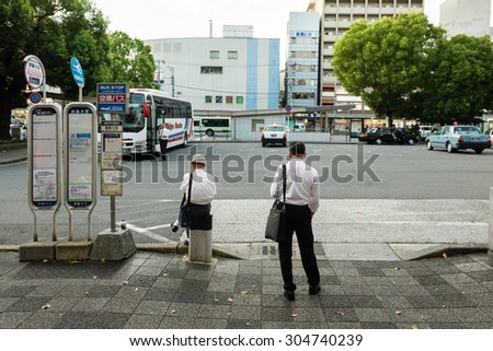 KYOTO, JAPAN - JULY 13, 2015: People waiting for Bus.
