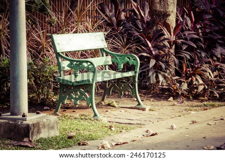 chair in park after post production with color filter effect