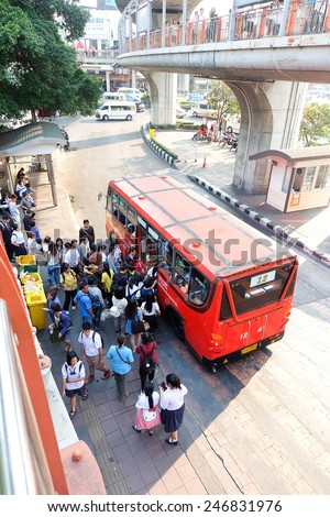 Bangkok, Thailand - JANUARY 20: Unidentified people get on a local bus at Victory monument circle  on January 20, 2015