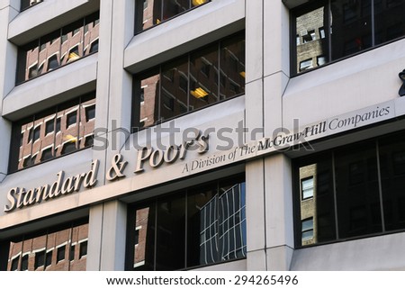NEW YORK CITY, USA - MAY 19, 2014: The headquarter of the american financial company standard and poors in lower manhattan. The picture shows the logo and the front of the building.