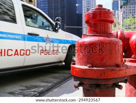 CHICAGO, USA - MAY 24, 2014: A Car of Chicago Alternative Police strategy (CAPS) staying in front of a hydrant at Michigan Avenue.