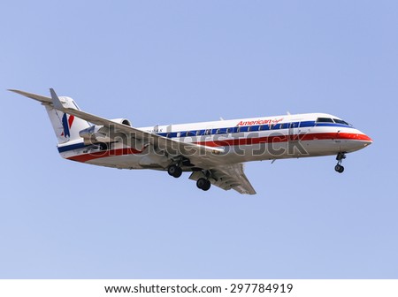 LOS ANGELES, USA - JUNE 6, 2014: An airplane of American Airlines (American Eagle) landing at Los Angeles International Airport.