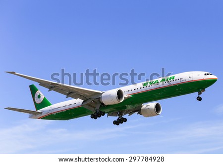 LOS ANGELES, USA - MAY 30, 2015: An airplane of Eva Air (Boeing 777-300ER) landing at Los Angeles International Airport.