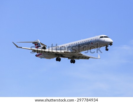 LOS ANGELES, USA - MAY 30, 2015: An airplane of American Airlines (American Eagle) landing at Los Angeles International Airport.