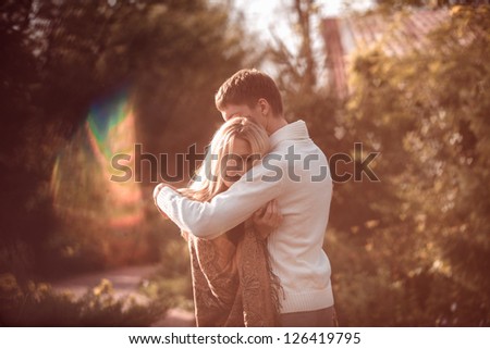 happy young couple in love outdoor in autumn