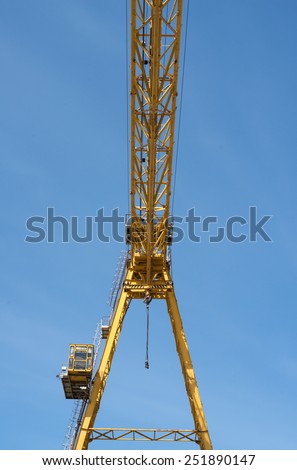 Gantry crane against the blue sky background